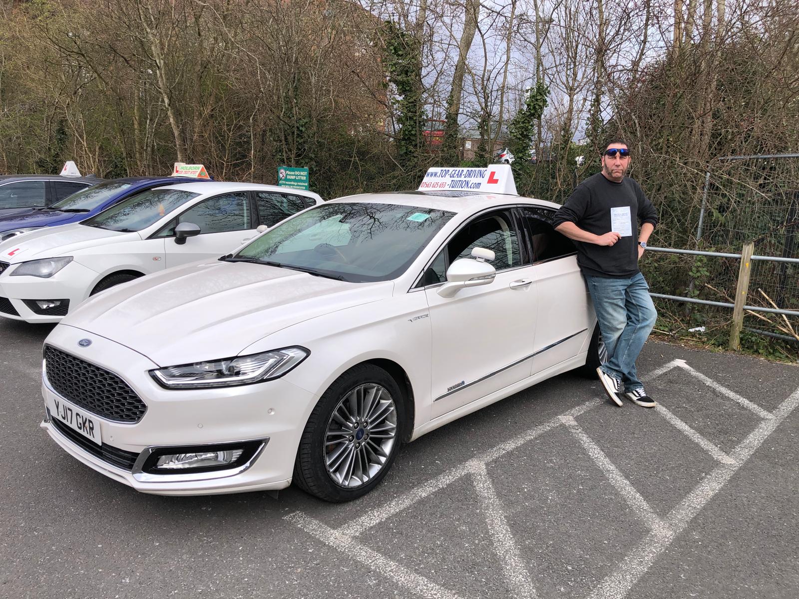 Student 19 celebrating passing their driving test with Top Gear Driving School