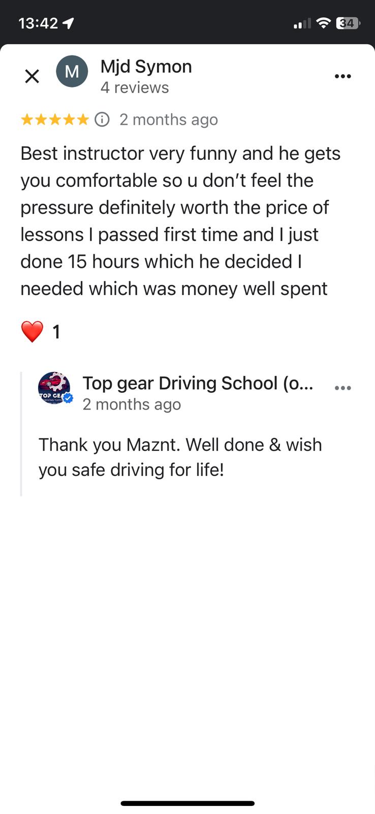 Student 3 celebrating passing their driving test with Top Gear Driving School